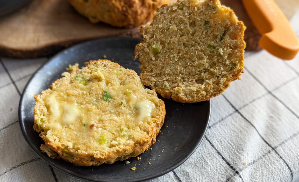 sliced and buttered cheddar and spring onion gluten free roll